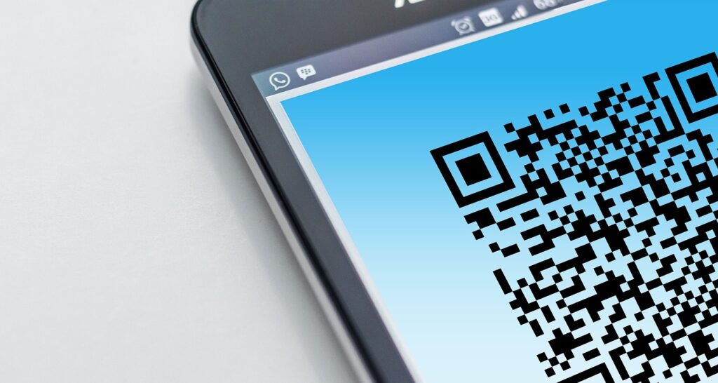 Illustrative QR code on smartphone image for QR payment scam awareness
